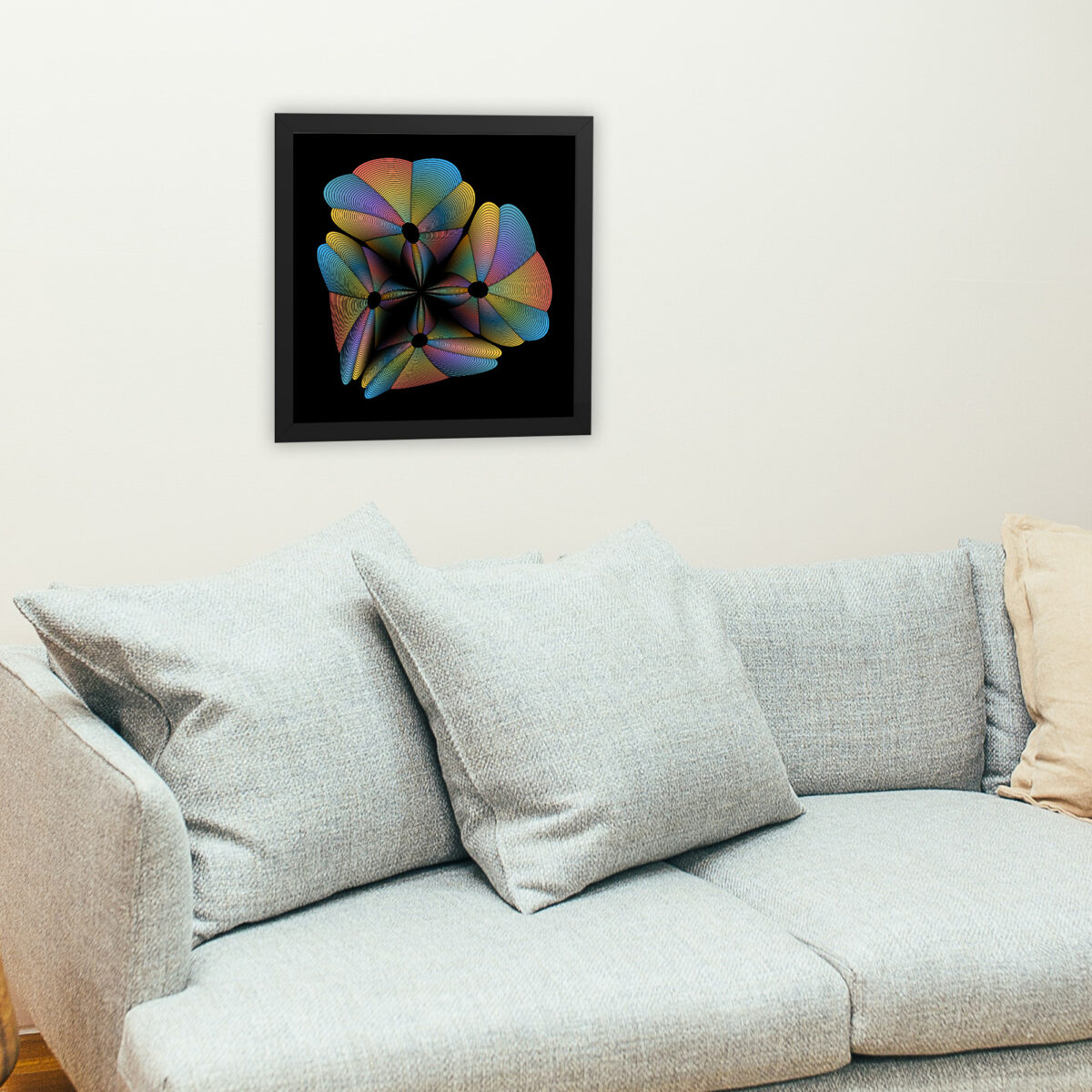 Black framed Big Bang art print hanging on a wall