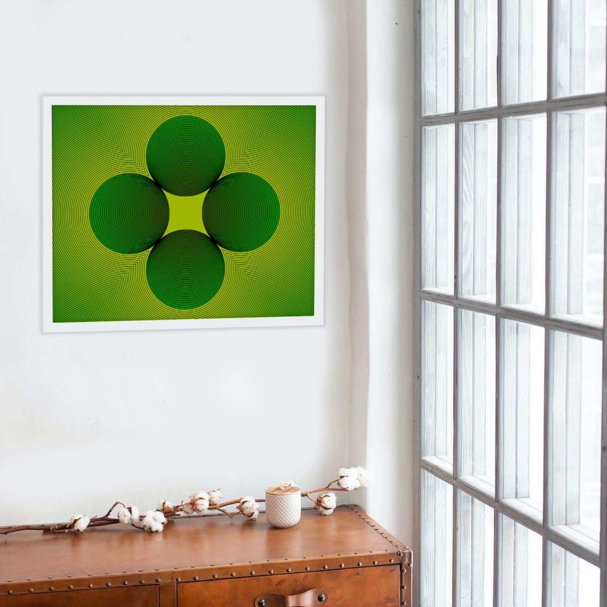White framed Clover art print hanging on a wall