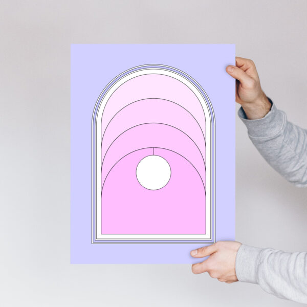 Photo of a person holding a Portal art print.