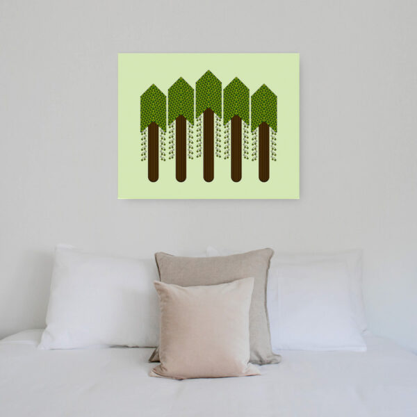 Photo of a Forest canvas print hanging on a wall above a bed.