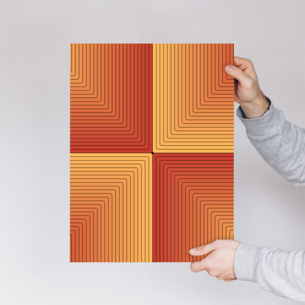 Photo of a person holding a Scorcher art print.
