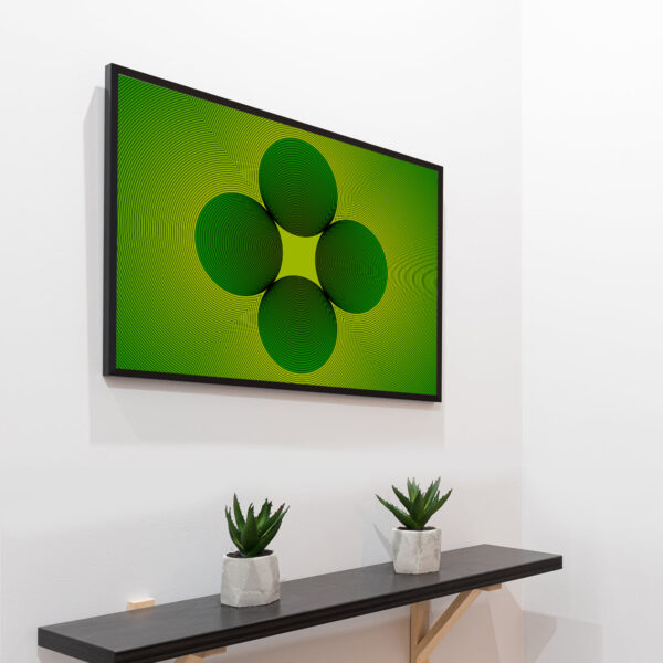 Photo of a Clover framed art print hanging on a wall above a table.